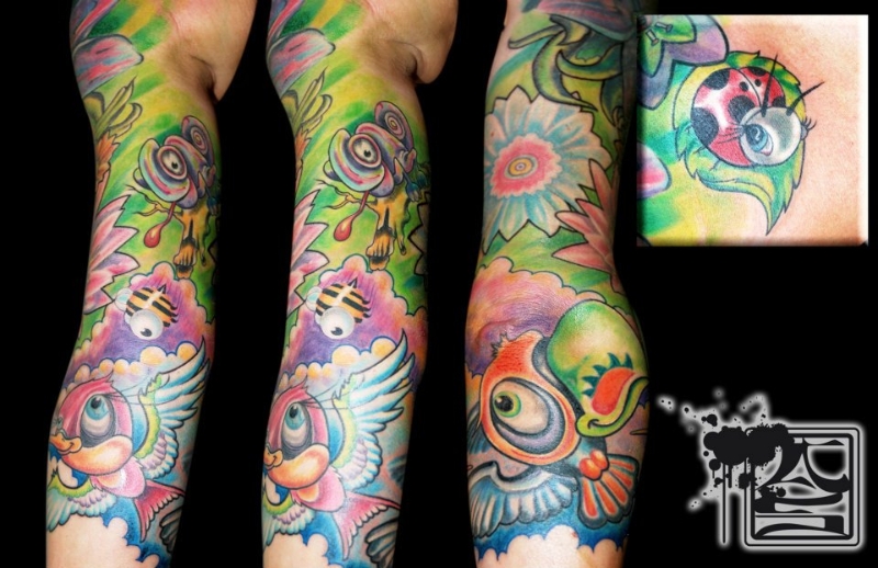 Colorful Nature Inspired Sleeve Tattoo