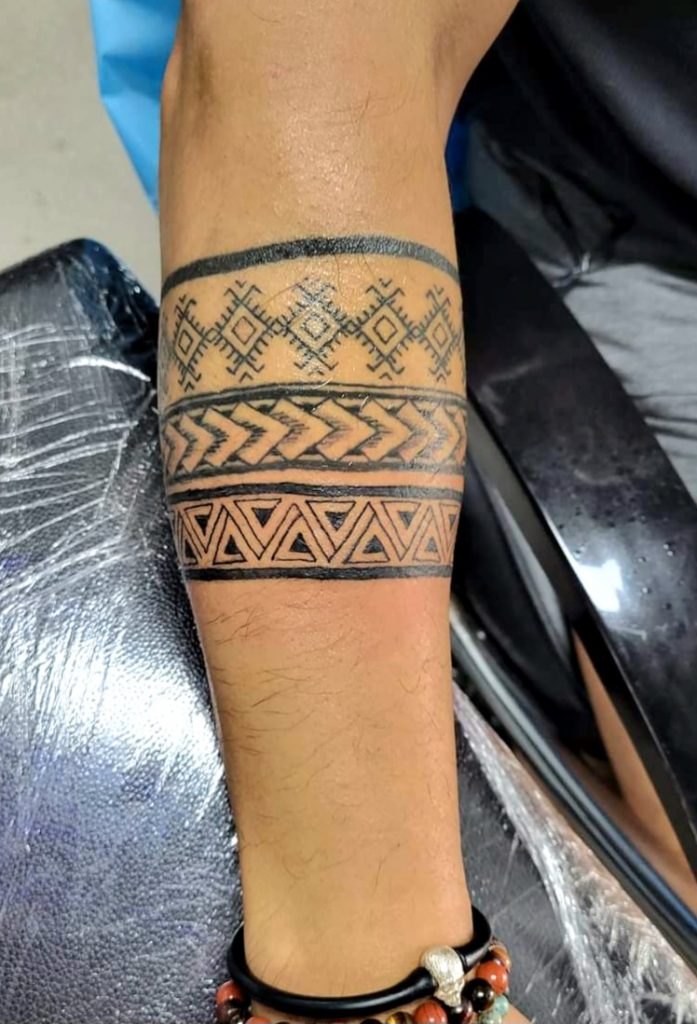 Free hand Polynesian Arm Band Tattoo