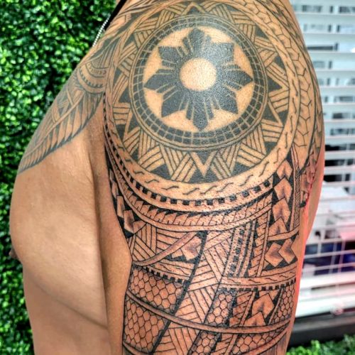 Free hand Polynesian Half Sleeve Tattoo