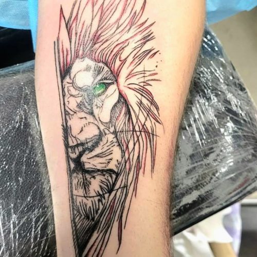 Creative Sketched Lion Arm Tattoo